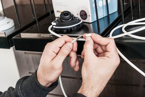 Installer setting up Axis camera