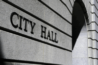 Exterior of a city hall building representing municipal security and public safety management.