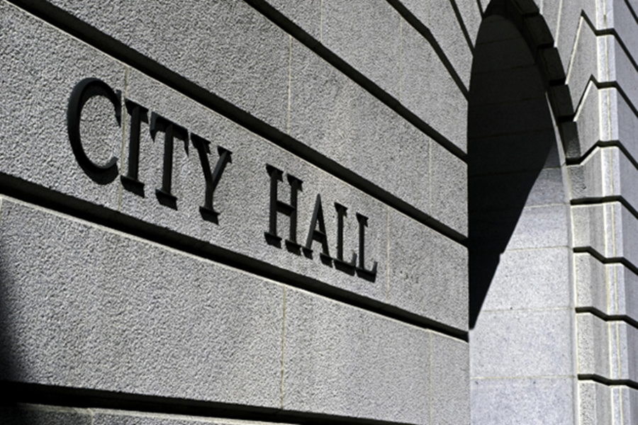Exterior of a city hall building representing municipal security and public safety management.