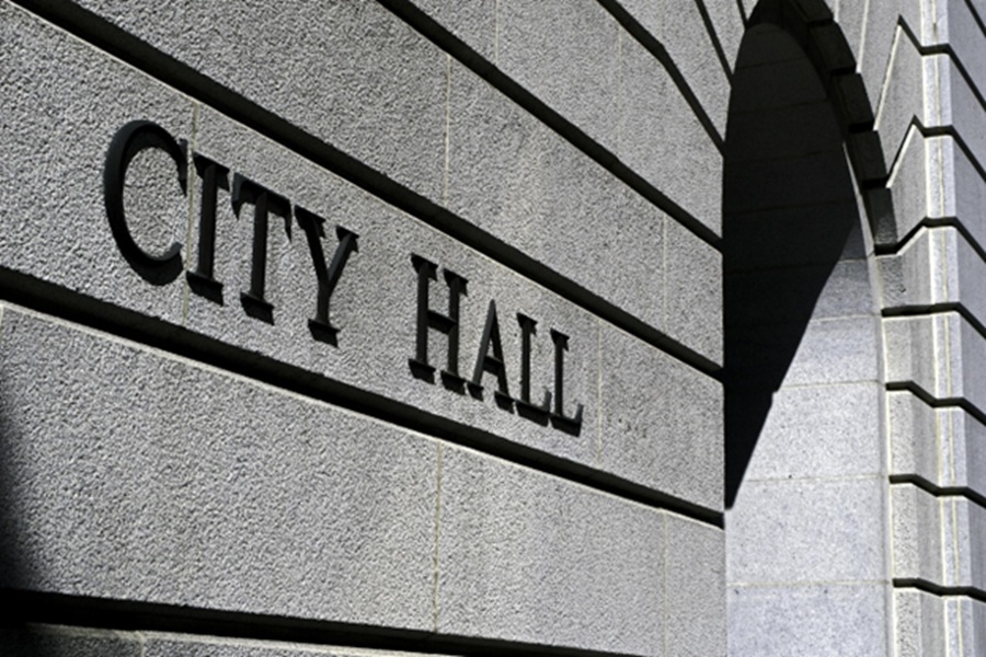 Exterior of a city hall building representing municipal security and public safety management.