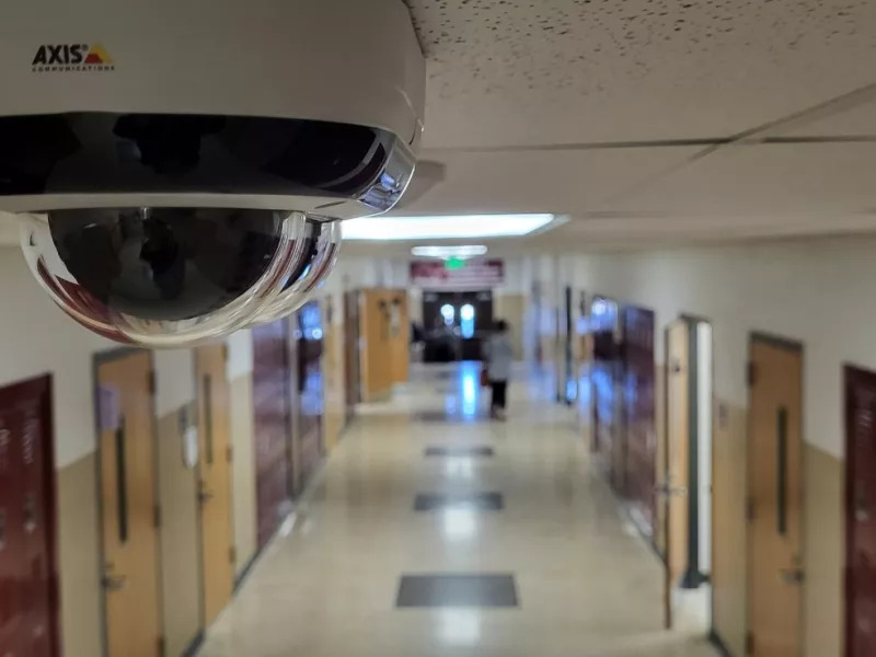 Axis camera overlooking school hallway.
