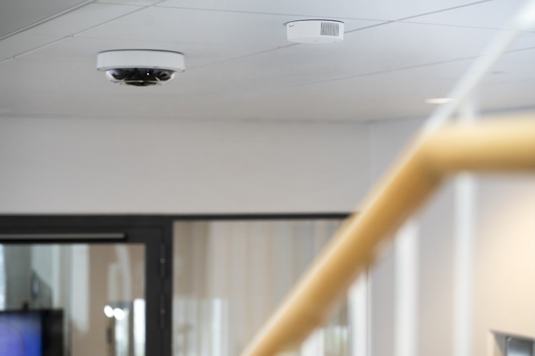 multi-sensor camera overlooking school hallway