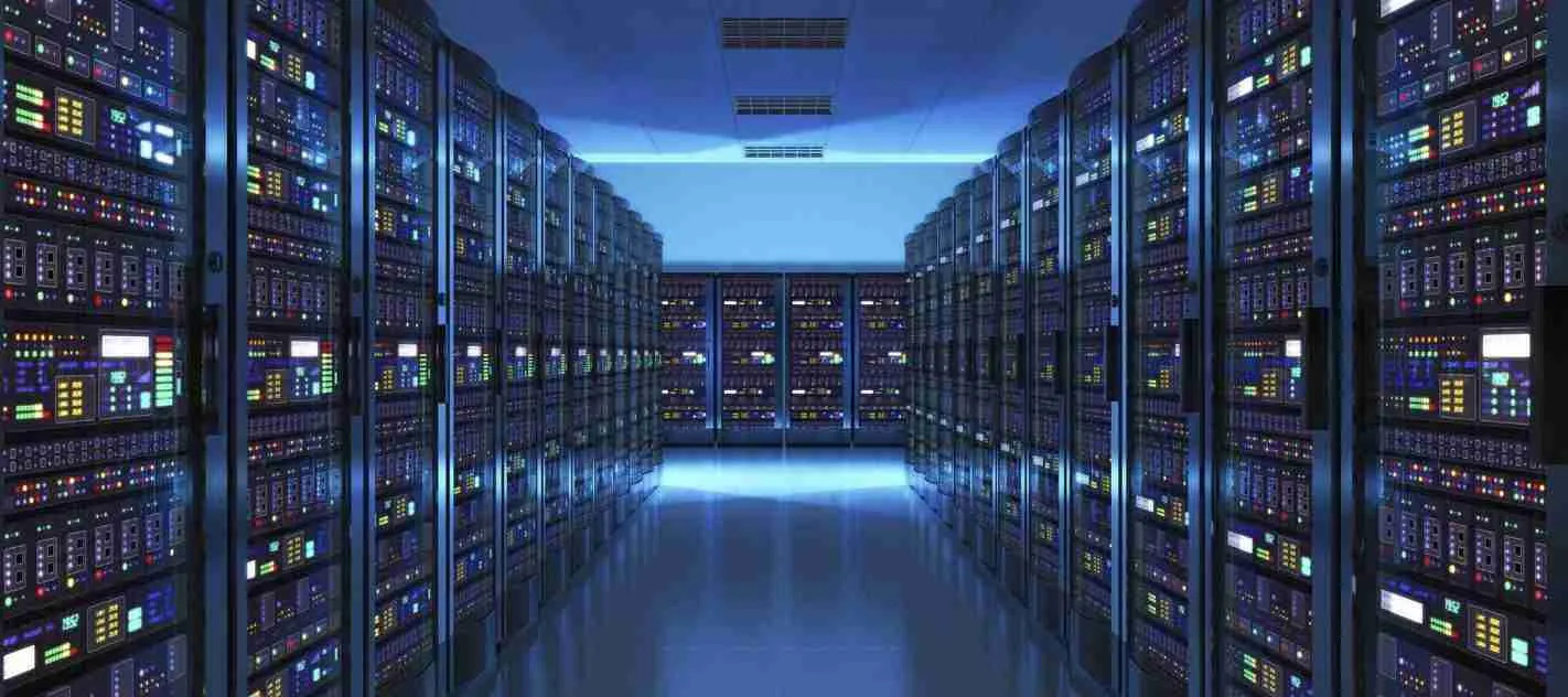 a row of servers in an extensive server room.