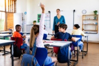 students participating in a classroom