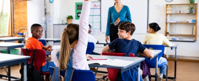 students participating in a classroom